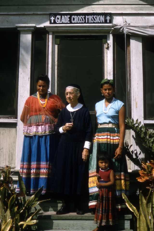 Deaconess Bedell with Seminole Indians at Glade Cross Mission in Everglades City, April 1958
