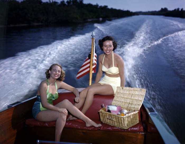 Lois Duncan Steinmetz (left) and Polly Gaines in a motorboat: Sarasota, 1950