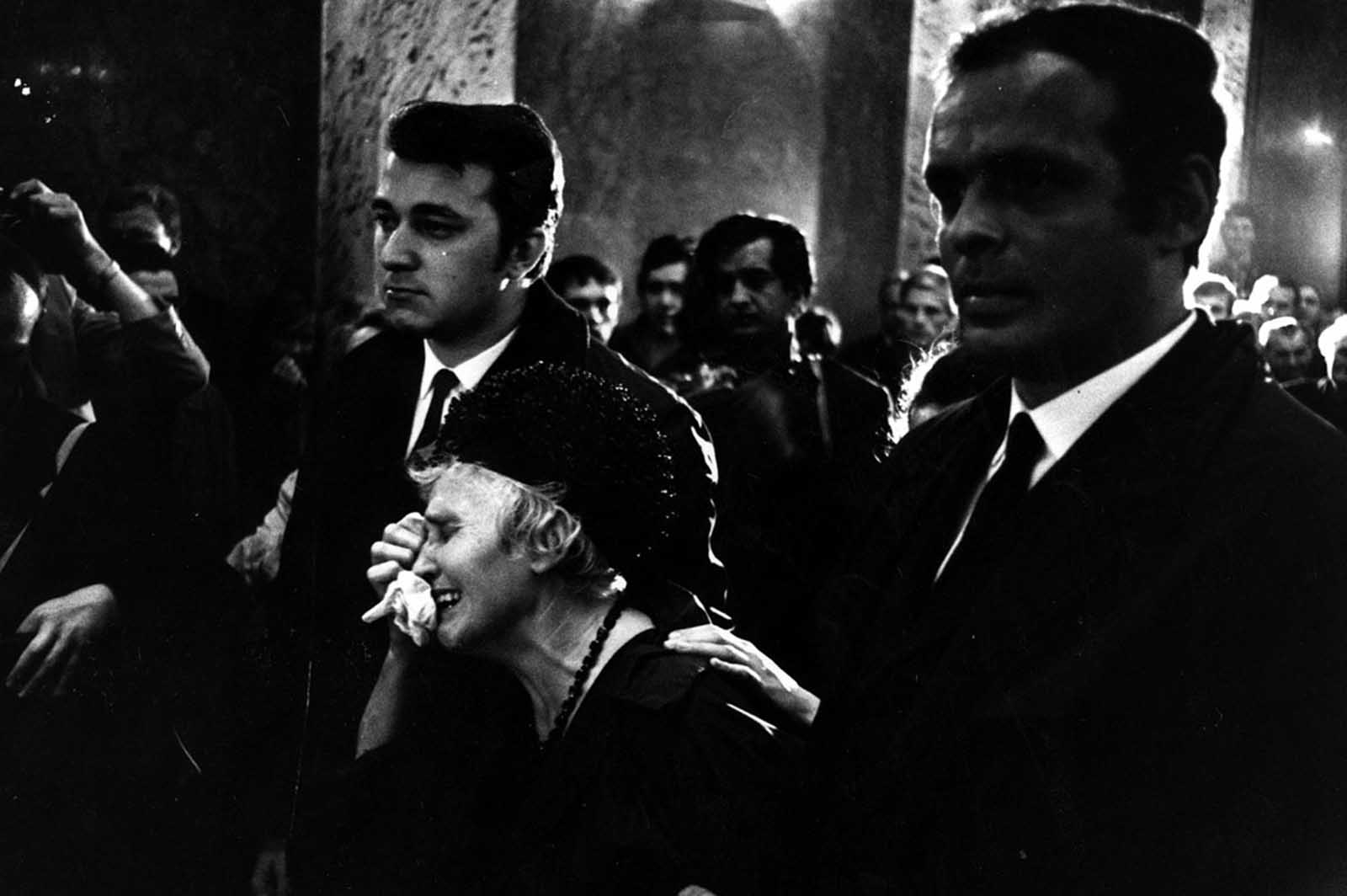 A woman weeps at a funeral for one of the victims of the fighting in Czechoslovakia