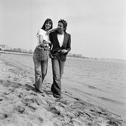 1974, Cannes, France --- French singer and songwriter Serge Gainsbourg and his partner, British actress and singer Jane Birkin, attend the 1974 Cannes Film Festival.