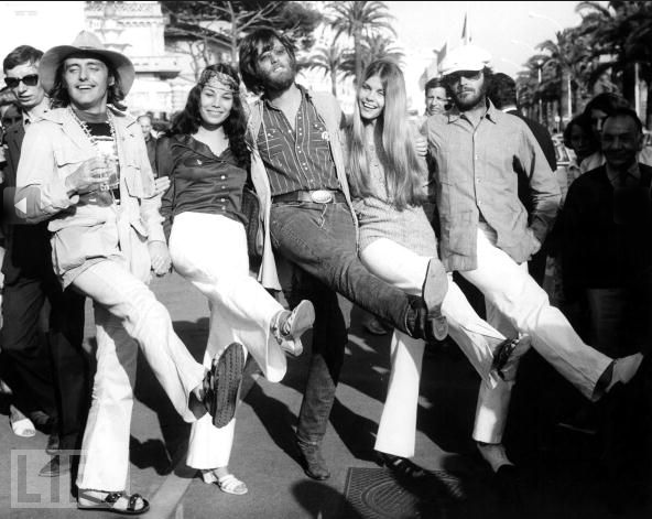 Dennis Hopper, Peter Fonda, and Jack Nicholson form up a kick line at the Cannes Film Festival to promote "Easy Rider" in 1969. Six years later, the Palm d'Or would finally be reintroduced.