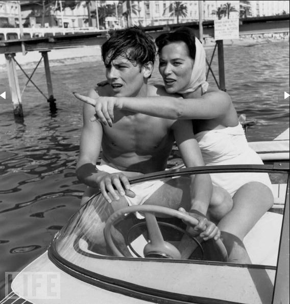 Alain Delon and Bella Darvi go boating during the Cannes Film Festival on May 5, 1958. The festival was launched for real in 1946, and made a secret agreement to take alternate years off so as not to compete with the film festival in Venice.