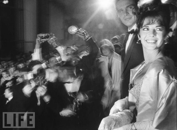 Warren Beatty and Natalie Wood are caught by the paparazzi at the Cannes Film Festival in 1962.
