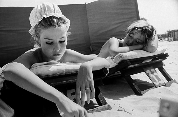 Actress Annette Vadim (L), sunbathing on beach at St. Tropez, French Riviera, w. her sister Mirette Stroyberg (R).