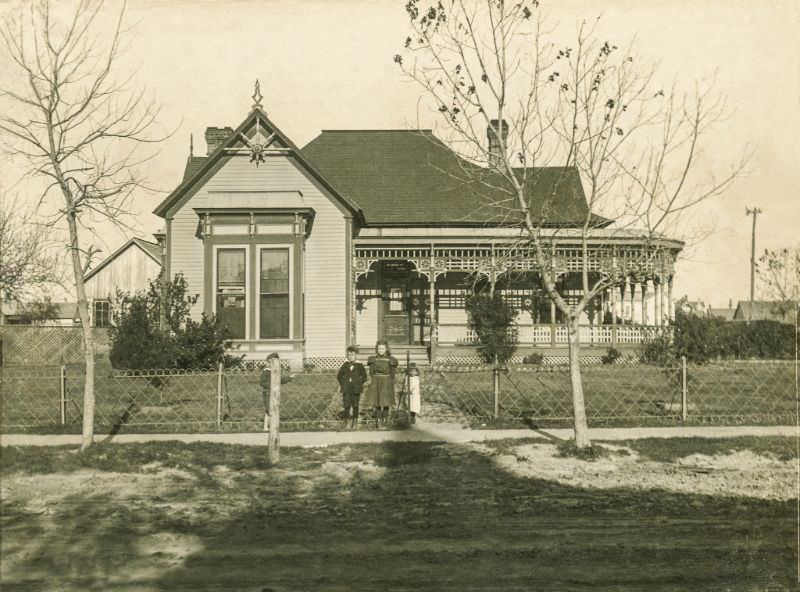 Kids in front of house in Greenville, Texas