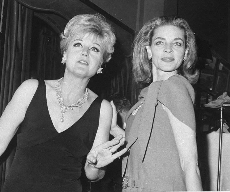 Angela Lansbury and Lauren Bacall as they arrive for the Film Critics Award's party at Sardi's restaurant, January 1966.