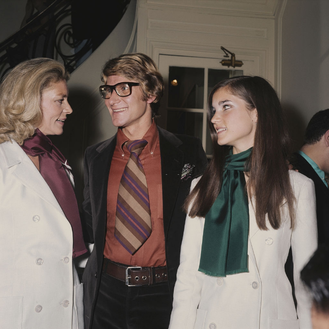 Lauren Bacall with her daughter Leslie Bogart and fashion designer Yves Saint Laurent at a showing of the designer's latest collection in Paris, July 1968.