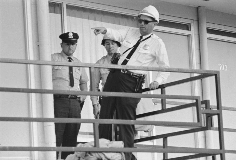 Police officers assess the scene at the Lorraine Motel, moments after King is rushed to the hospital and pronounced dead.