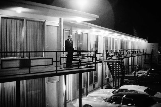 Will D. Campbell, alone on the Lorraine Motel balcony, gazes out into the night.