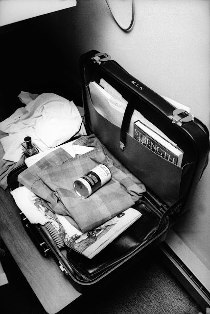Martin Luther King, Jr.'s neatly packed, monogrammed briefcase in his room at the Lorraine Motel, April 4, 1968 — with his brush, his pajamas, a can of shaving cream and his book, Strength to Love, visible in the pocket.