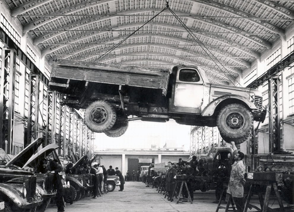 An Afghan worker checks a Russian-made truck in the Kabul Janagalak factory in an unspecified date. The factory situated in the center of the city as the only firm for making vehicle's chassis was plundered, like other public properties in the Afghan capital, during the Afghan mujahedin rule from 19