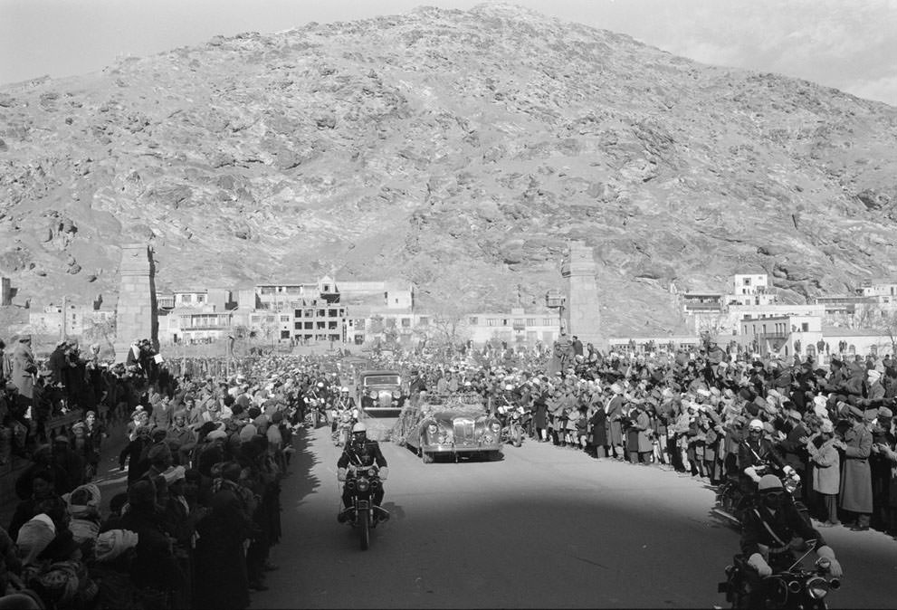 Motorcade for President Eisenhower's visit to Kabul, Afghanistan, on December 9, 1959. Eisenhower met briefly with the 45-year-old Afghan king, Mohammad Zahir Shah, to discuss Soviet influence in the region and increased U.S. aid to Afghanistan.