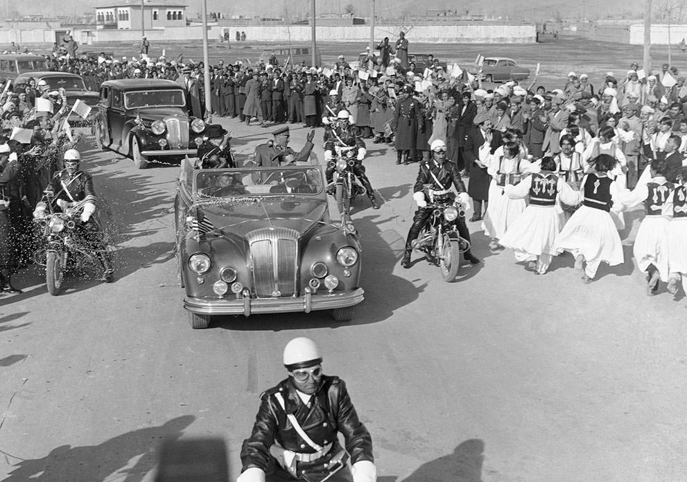 Dancers perform in street of Kabul, Afghanistan, December 9, 1959 following President Eisenhower's arrival from Karachi. After a five hour stay in Kabul, Ike flew on to New Delhi.