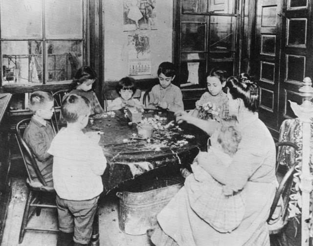 A family making artificial flowers
