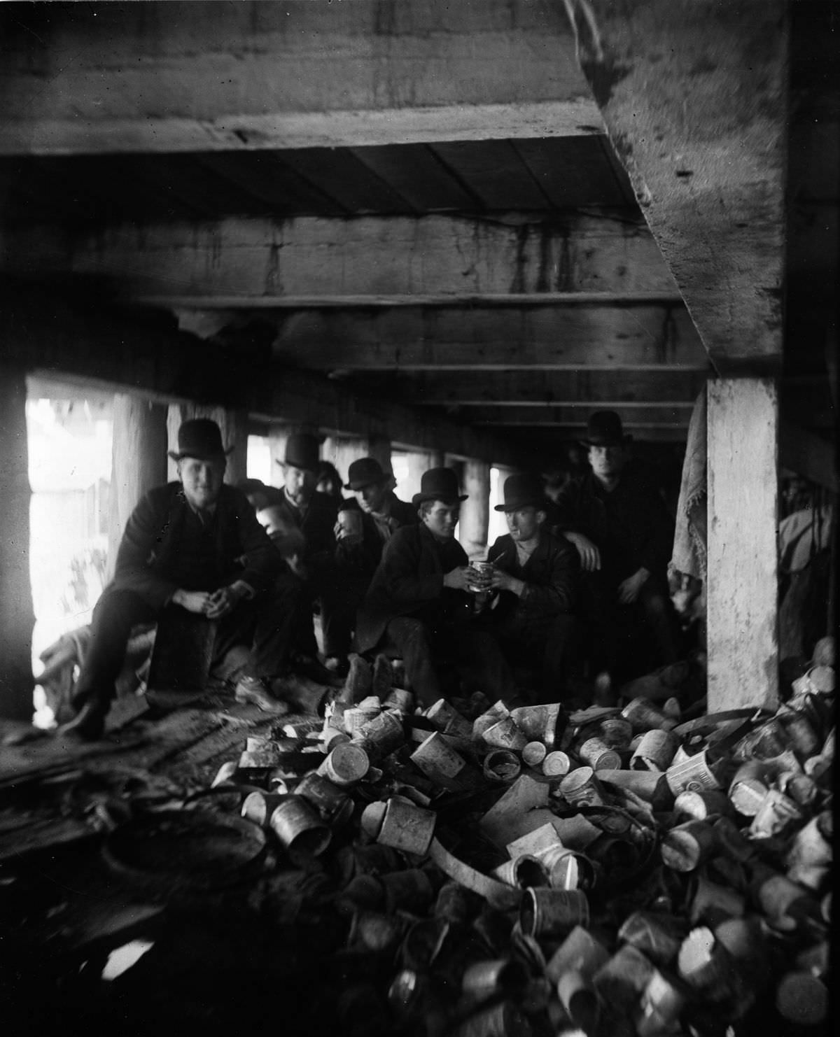 Members of the "Short Tail" gang, which terrorized New York's east side, gather under the pier at the foot of Jackson Street, 1887