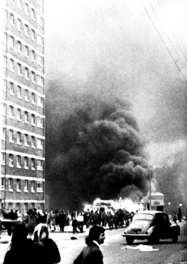 Vehicles burn in the New Lodge Road area of Belfast when a crowd of about 200 set fire to cars, vans and lorries after an army scout car ran over and killed a five-year-old girl. 8 Feb, 1971