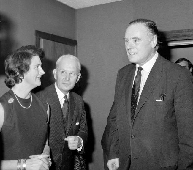 Prime Minister of Northern Ireland Brian Faulkner and his wife Lady Lucy Faulkner during a private reception at the Ulster office with Mr Reginald Maulding