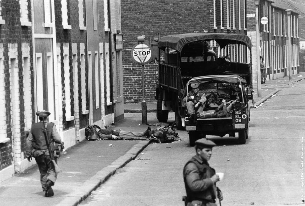 British soldiers impose a curfew on the Falls Road in Belfast, July 1970.