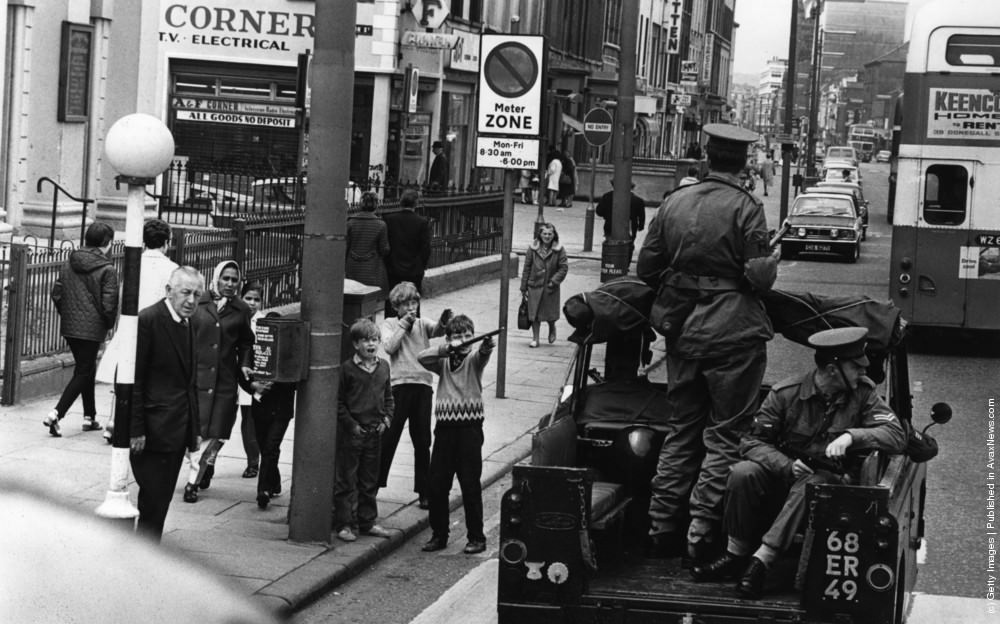 Children mocking an Army patrol in Belfast, July 1970.
