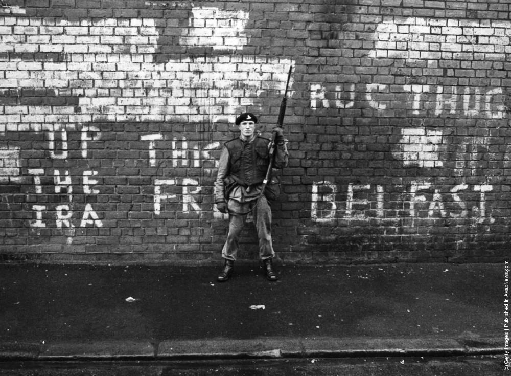 An armed British soldier on patrol in Belfast, 24th March 1971.