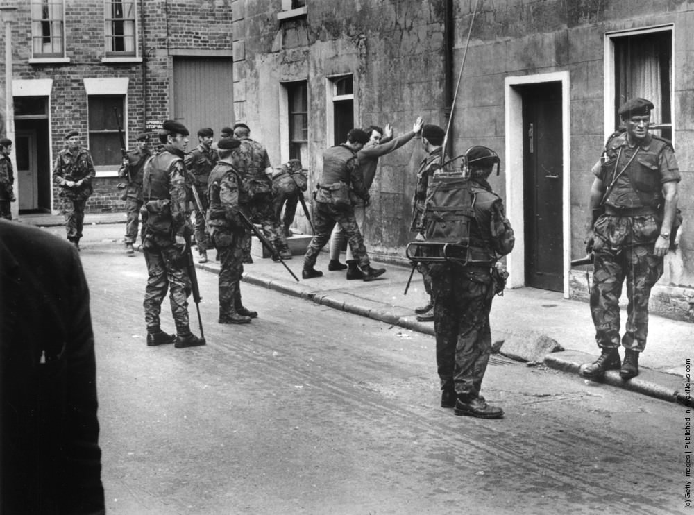 British troops searching a civilian in Belfast, 12th August 1971.