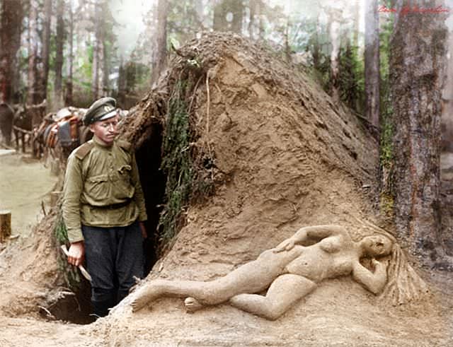 Russian scout Alekseev and his sculpture of moist sand