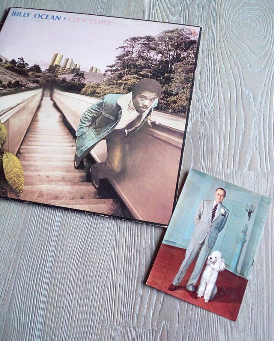 The photo of Prince Bernhard of the Netherlands and a beautiful Standard Poodle inside a copy of 'City Limit' by Billy Ocean.