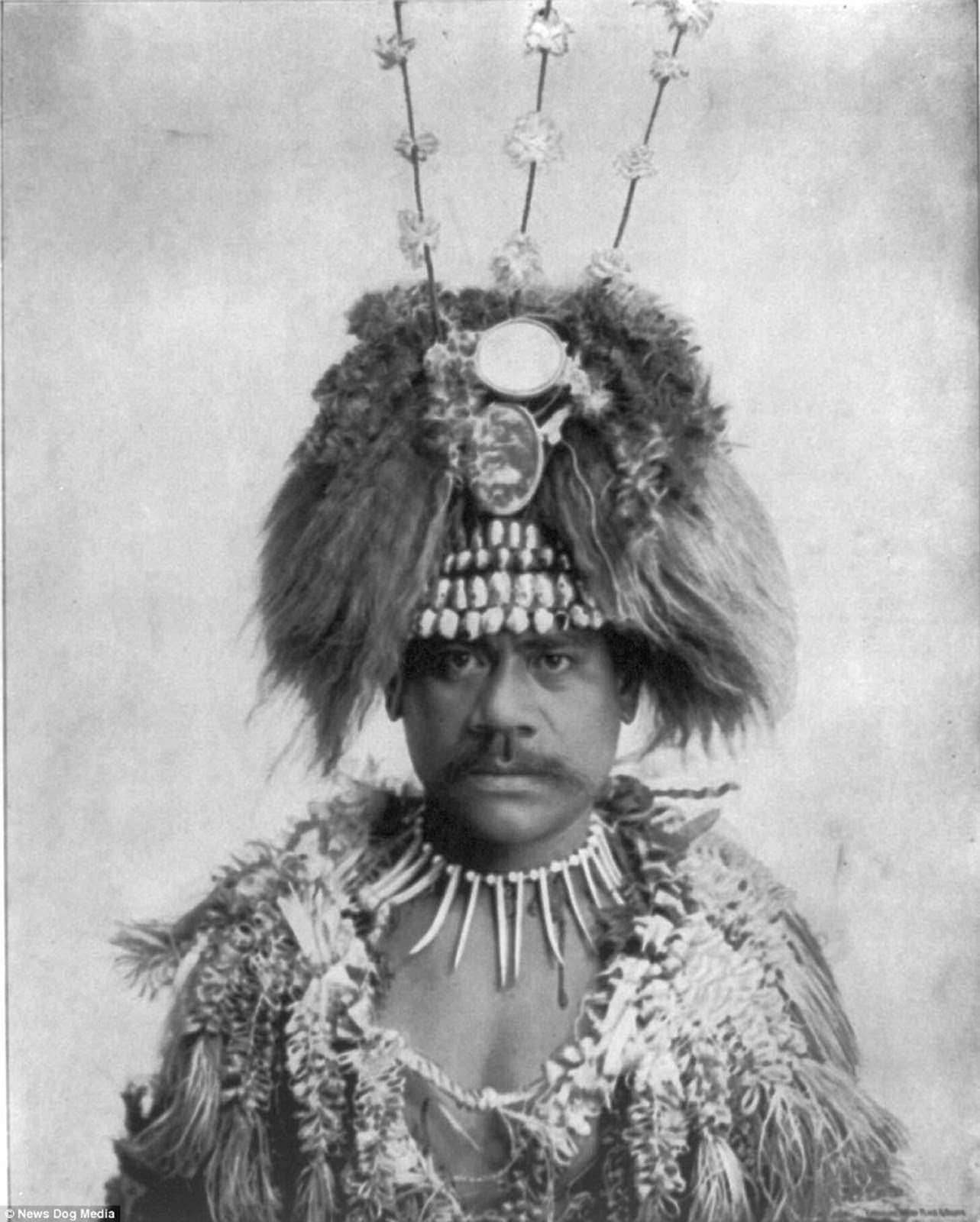 A man in native headgear and dress at the World’s Columbian Exposition in Chicago, Illinois in about 1893.
