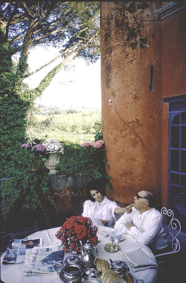 Sophia Loren and Carlo Ponti out on the terrace of their villa having breakfast.