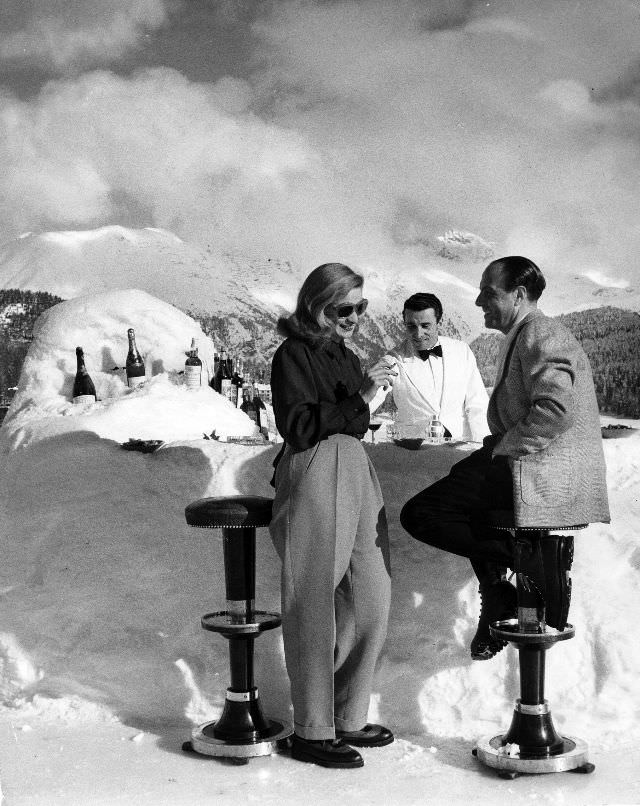 Midday cocktails at St. Moritz are served on the private ice rink of the Palace Hotel at a bar made of snow.
