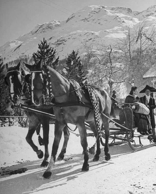 Sleigh-ride in snow-covered winter-resort village St. Moritz.