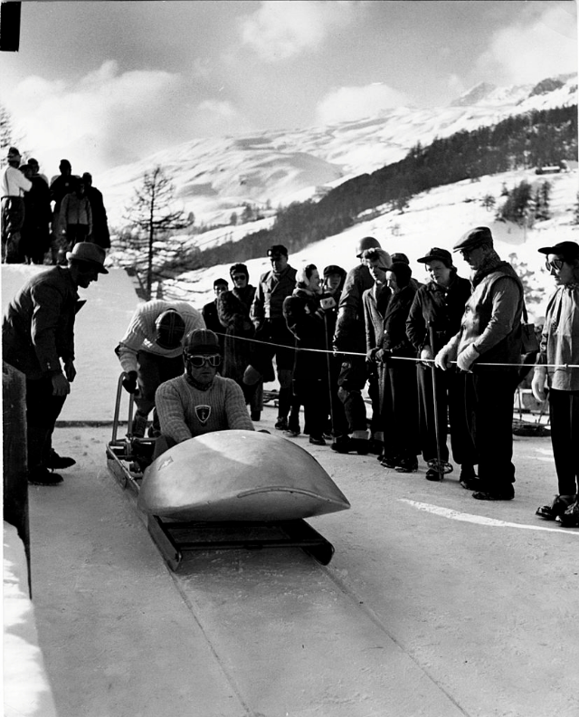 Swiss bobsledders at start of practice run.