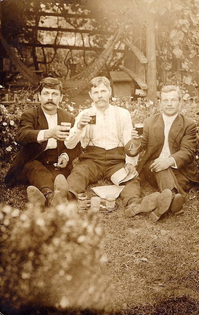 Three men having a liquor party before the prohibition day.