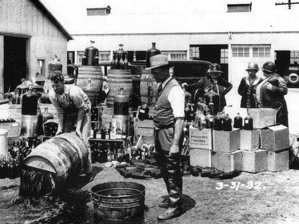 Casks of booze go straight down the drain as Prohibition takes effect.
