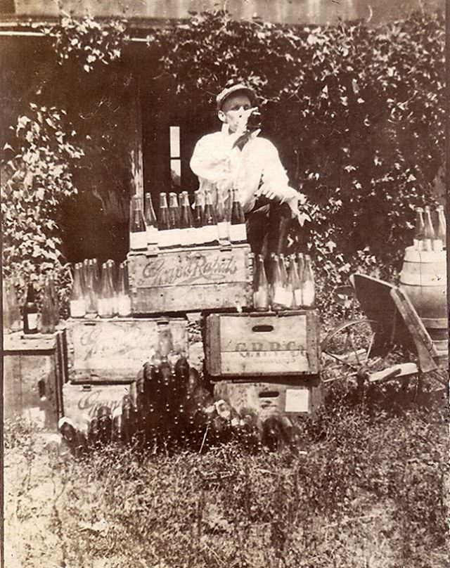 The day before prohibition, a man dirnking bottles.