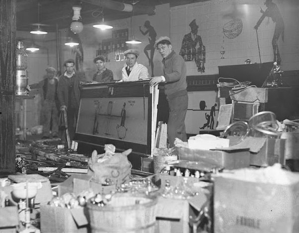 Officers Dismantle a Speakeasy After Raid, Boston