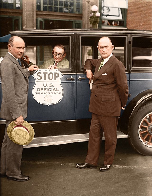 Stop when you see this sign! The Bureau of Prohibition adopted a special insignia plate for use by prohibition agents in stopping suspected automobiles.