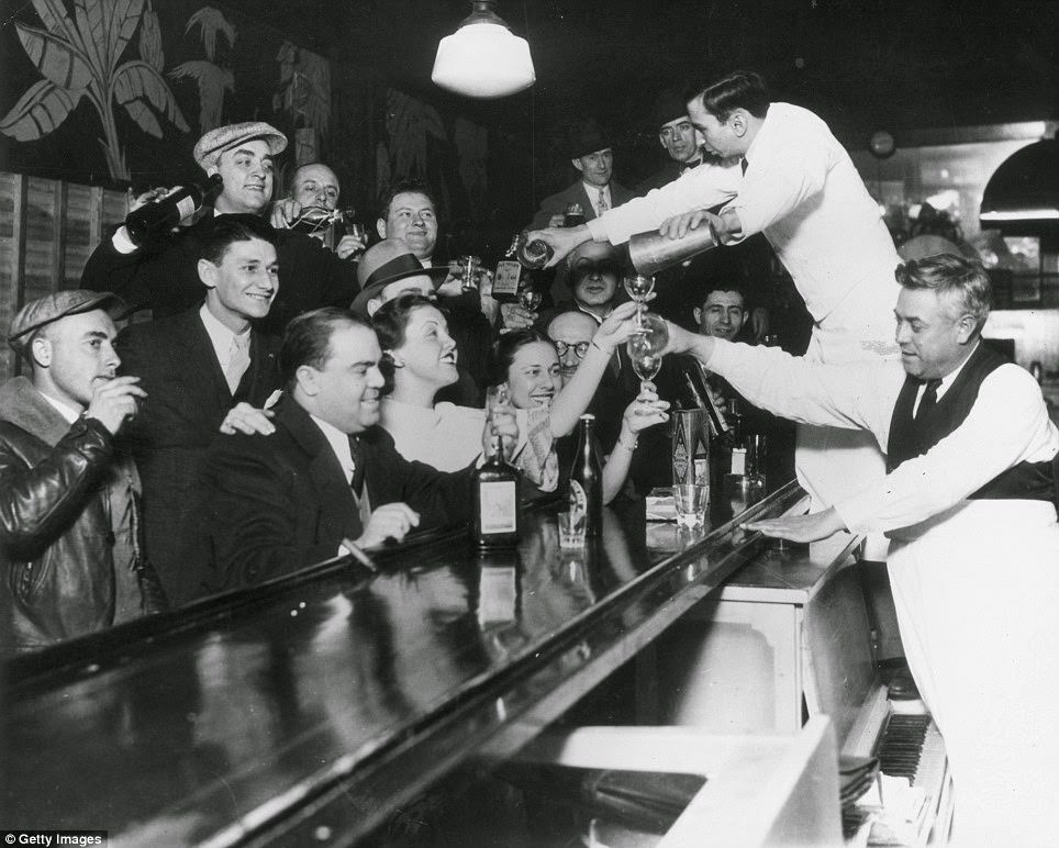 Bartenders at Sloppy Joe's pour a round of drinks to celebrate the end of prohibition in Chicago