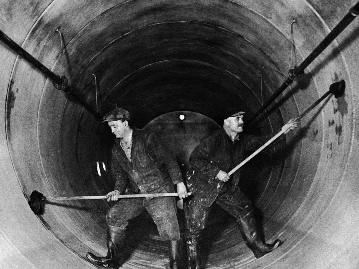 Two New York Brewery workers scrub a large tank of beer on November 23, 1932 that had remained empty during Prohibition. With the repeal of the Eighteenth Amendment and the end of the Volstead Act, the stills were ready for use again.