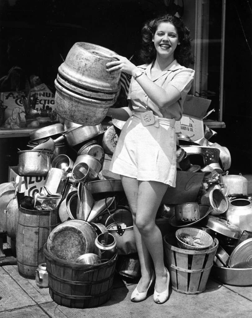 Marie Beiser, Baltimore beauty, took a personal hand in collecting scrap aluminum for defense purposes, July 25, 1941.