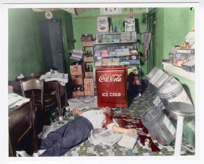 The dead body of Joseph Rosen, a candy shop owner who was killed by Murder Inc. leader Louis "Lepke" Buchalter in his own store in Brooklyn. 1936.