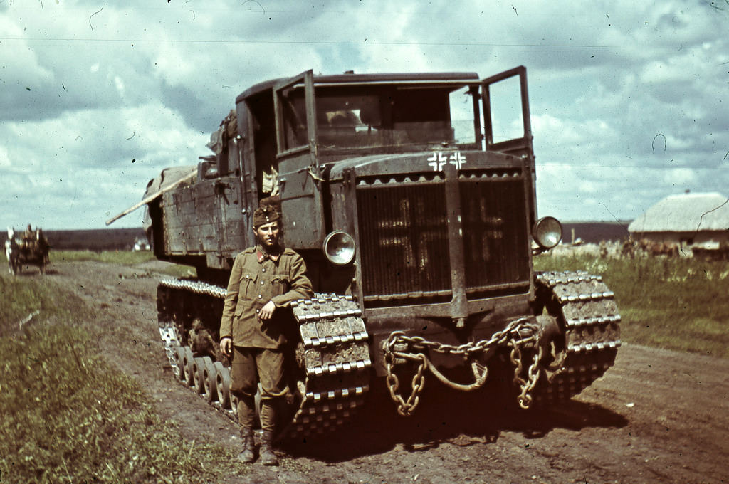 Hungarian soldiers with a captured Soviet Voroshilovets heavy artillery tractor, 1942