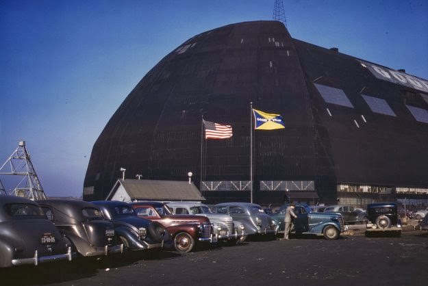 Formerly an aircraft dock, this huge building — thought to be the largest in the world with no interior supports — is now the scene of many busy shops turning out aircraft sub-assembly parts, at the Goodyear Aircraft Corp., in Akron, Ohio.