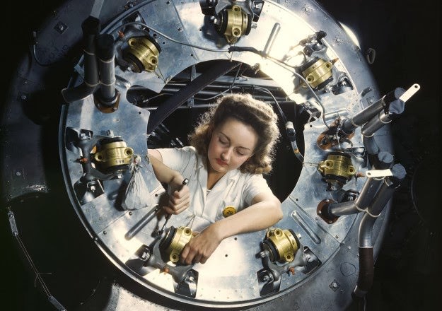 Part of the cowling for one of the motors for a B-25 bomber is assembled in the engine department of North American Aviation’s Inglewood, California, plant, in October of 1942