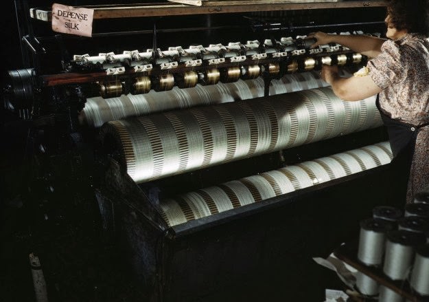 The water stretching machine of an eastern parachute manufacturer stretches shroud lines so as to make them more adaptable to the finished product, in Manchester, Connecticut, in July of 1942