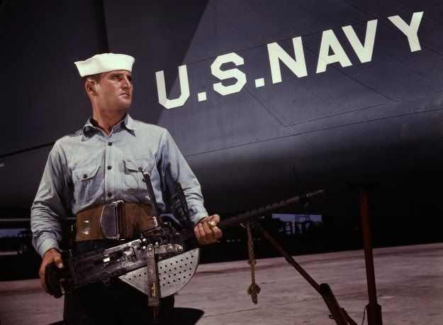 After seven years in the Navy, J.D. Estes is considered an old sea salt by his mates at the Naval Air Base, Corpus Christi, Texas, in August of 1942