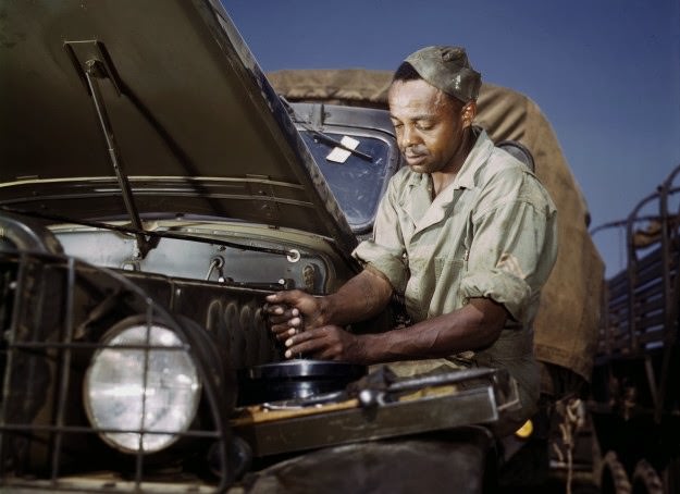 Colored mechanic, motor maintenance section, Ft. Knox, Kentucky. Photographed in June, 1942