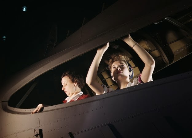 American mothers and sisters, like these women at the Douglas Aircraft Company, give important help in producing dependable planes for their men at the front, in Long Beach, California, October of 1942