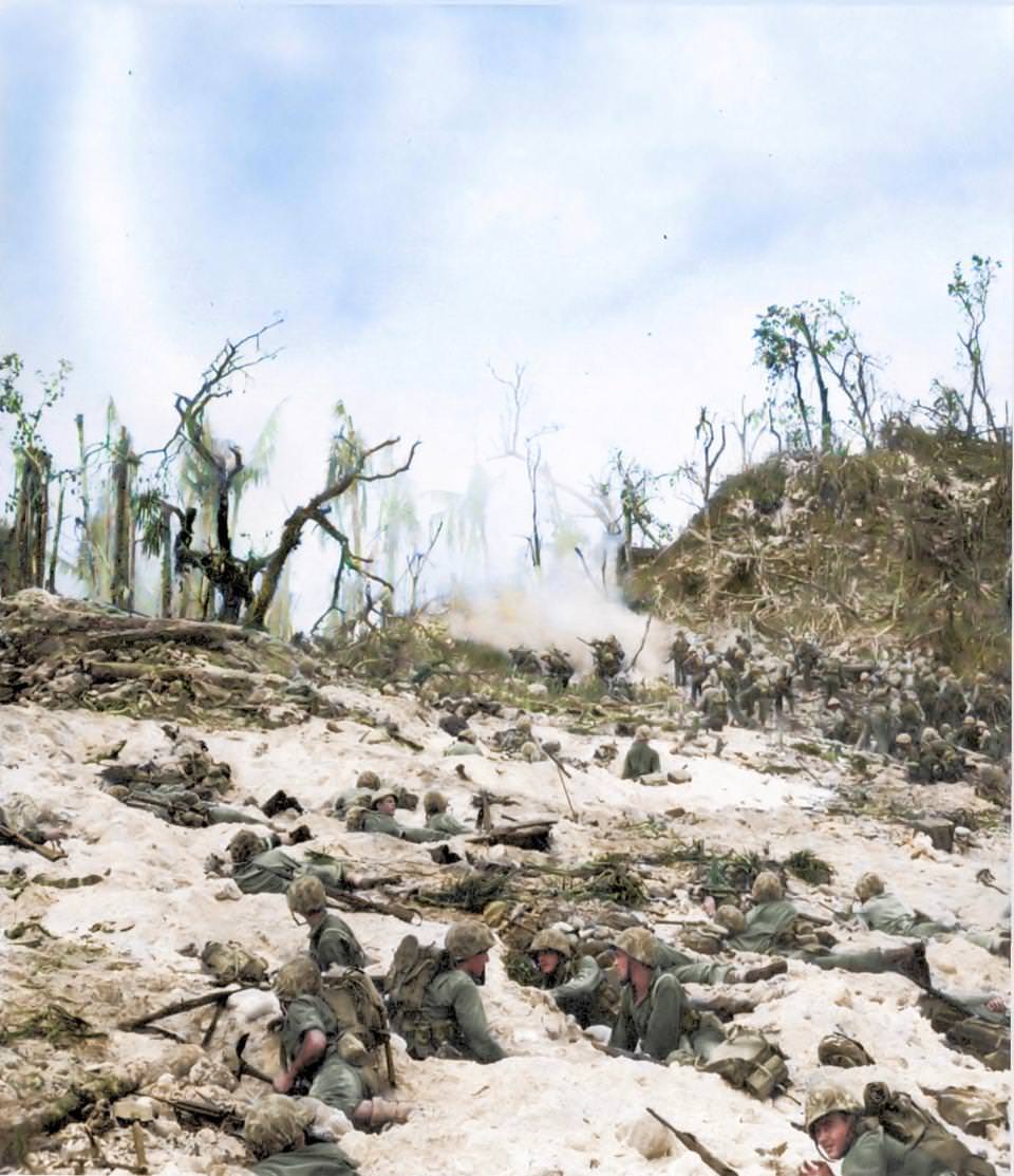 Men of the US 1st Marine Division fighting just beyond White Beach, Peleliu in September 1944.