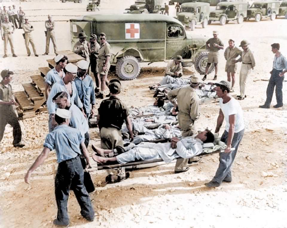 Survivors of USS Indianapolis en route to hospital after being rescued in August 1945. After the sailor's ship was sank by Japanese tornadoes, sharks swarmed the survivors in the wreckage.